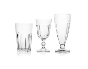 Set of empty glasses for different drinks on white background