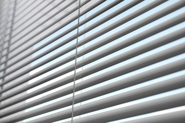Obraz premium Closeup view of window with horizontal blinds, low angle view