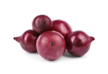 Fresh whole red onions on white background