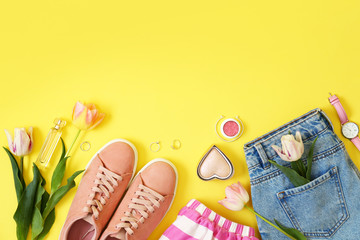 Flat lay composition with clothes and accessories on color background, space for text. Trendy...