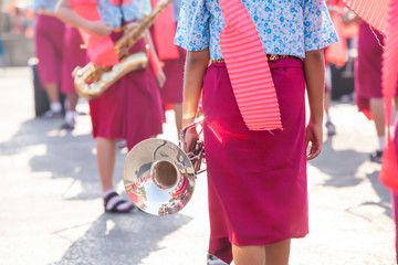 Thai high school band preparing for marching Thai New Year’s festival.