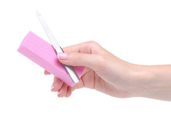 Manicure nail file and buff in hand on white background isolation