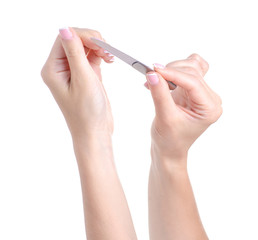 nail file in hand on white background isolation