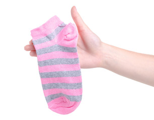 Pink socks in hand on white background isolation