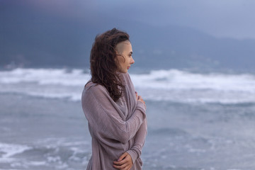 Young Woman at the Sea Coast Beach