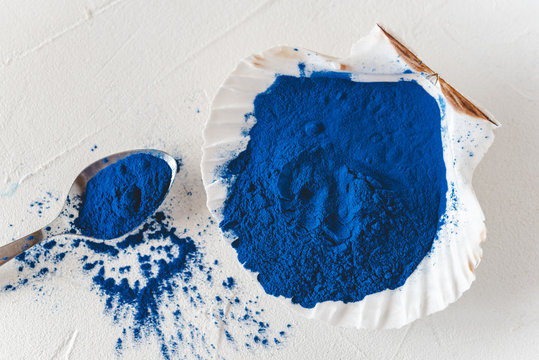Blue Spirulina algae powder, healthy dietary supplement.