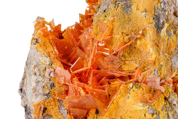 Macro stone mineral Wulfenite on a white background