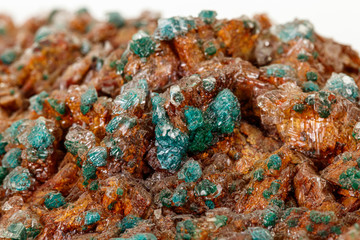 Macro stone mineral Wulfenite on a white background