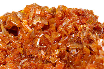 Macro stone mineral Wulfenite on a white background