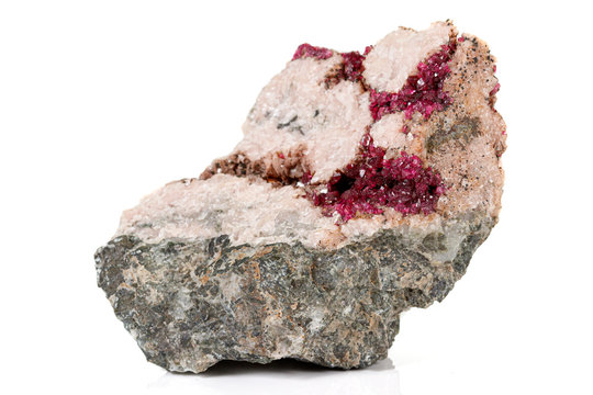 Macro stone Erythrite mineral on white background