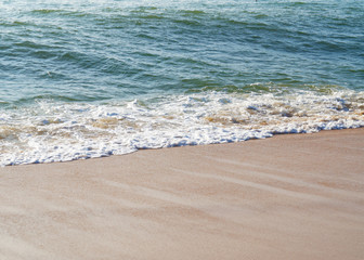 Sunny sandy coast on the ocean on the southern tropical island of Sri Lanka.
