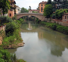 Fototapeta na wymiar river called Retrone in Vicenza City and the ancient Bridge of S