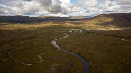 Fototapeta na wymiar Aerial view of the astonishing highlands found in Isle of Skye, Scotland.