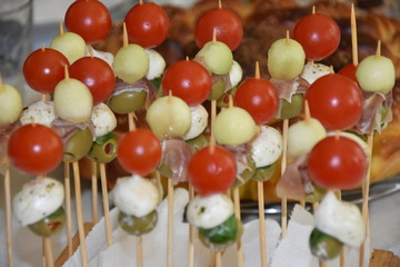 Assortment of canapes on wooden board. Banquet service. catering food