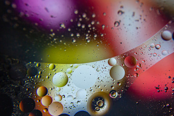 A beautiful water and oil art with acrylic paint colors in macro life size.