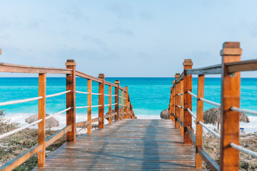 Wooded bridge and turquoise sea in Cayo Largo, Cuba