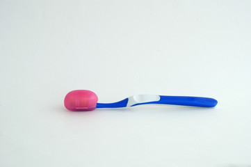 toothbrush in a travel case on a white background. space for text and advertising.