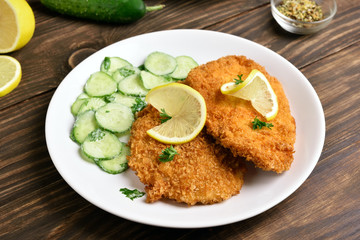 Schnitzel with cucumber salad