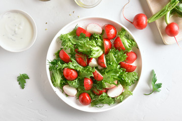 Salad with radish and lettuce leaves