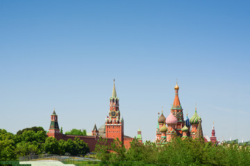 Fototapeta na wymiar St. Basil's Cathedral and Spasskaya tower Moscow kremlin summer day cityscape