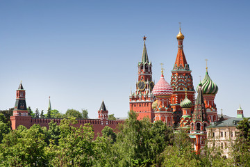 Fototapeta na wymiar St. Basil's Cathedral and Spasskaya tower Moscow kremlin summer day cityscape