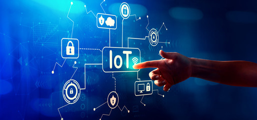 Obraz premium IoT security theme with hand pressing a button on a technology screen