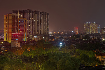 Obraz premium Beautiful night view over residential district Bach Dang in Ha Noi city (Hanoi), Vietnam.