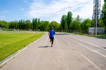 fast speed runner on the stadium sport track outdoor before the championships