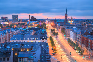 Copenhagen, Denmark cityscape at night - twilight skyline with light trails on H.C. Andersen...