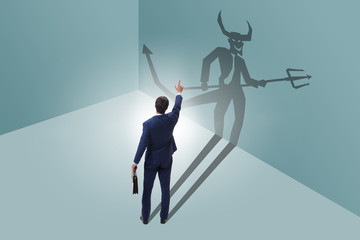 Devil hiding in the businessman - alter ego concept