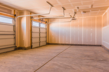Interior of a garage under construction with unfinished walls