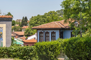 Fototapeta na wymiar Street and Nineteenth Century Houses in architectural and historical reserve The old town in city of Plovdiv, Bulgaria