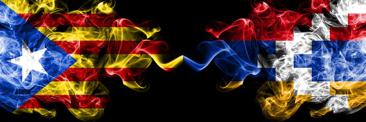 Catalonia vs Artsakh smoke flags placed side by side. Thick colored silky smoke flags of Catalonia and Artsakh