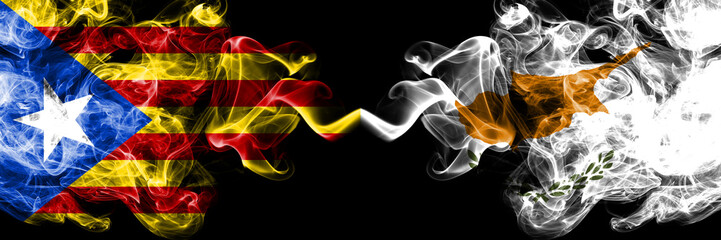 Catalonia vs Cyprus, Cyprian smoke flags placed side by side. Thick colored silky smoke flags of Catalonia and Cyprus, Cyprian