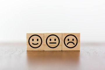 Smiley face, neutral face and sad face. Service rating and costumer satisfaction concept