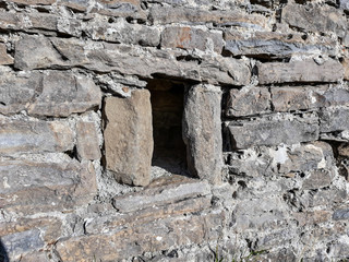 View of the millenary window. Hermitage of San Benito, in Orante (Huesca - Spain) . October 2017