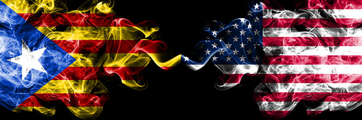 Catalonia vs United States of America, American smoke flags placed side by side. Thick colored silky smoke flags of Catalonia and United States of America, American