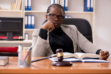 Black female lawyer in courthouse 