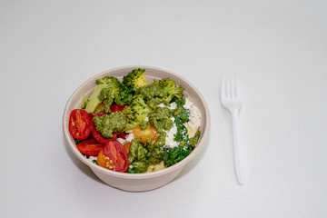  Mediterranean meal on white bowl - healthy fast food on white background