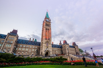 Fototapeta na wymiar View of Canada Parliament building in Ottawa during tulip festival