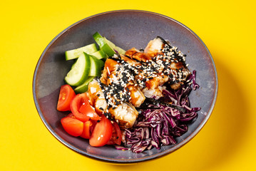 eel with fresh vegetables on the yellow backgound