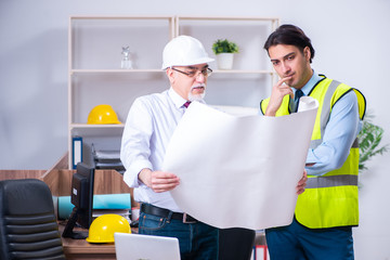 Two architects working on the project 