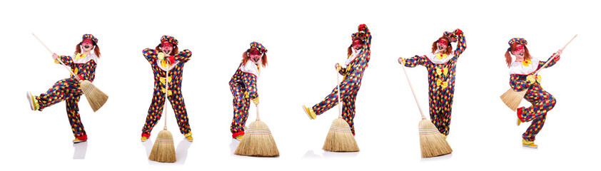 Clown with broom isolated on white