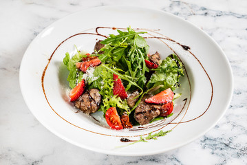 salad with strawberries and duck liver