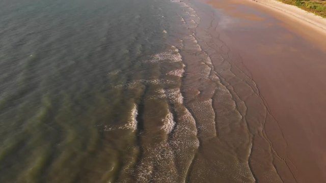 Aerial Drone footage of beautiful and clean beach of Batu Luang, Kuala Penyu, Sabah, Malaysia