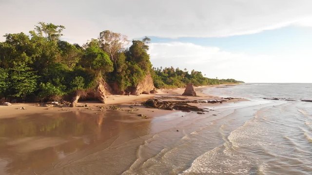 Aerial Drone footage of beautiful and clean beach of Batu Luang, Kuala Penyu, Sabah, Malaysia