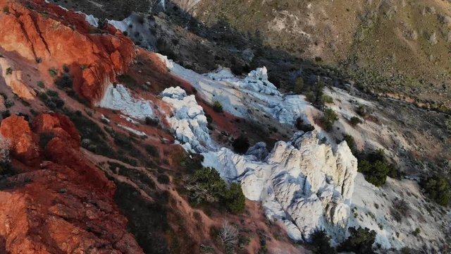 Aerial Flyover of Red and White Rock Landscape.