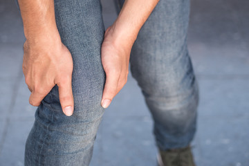 injured man suffered from knee joint pain, osteoarthritis
