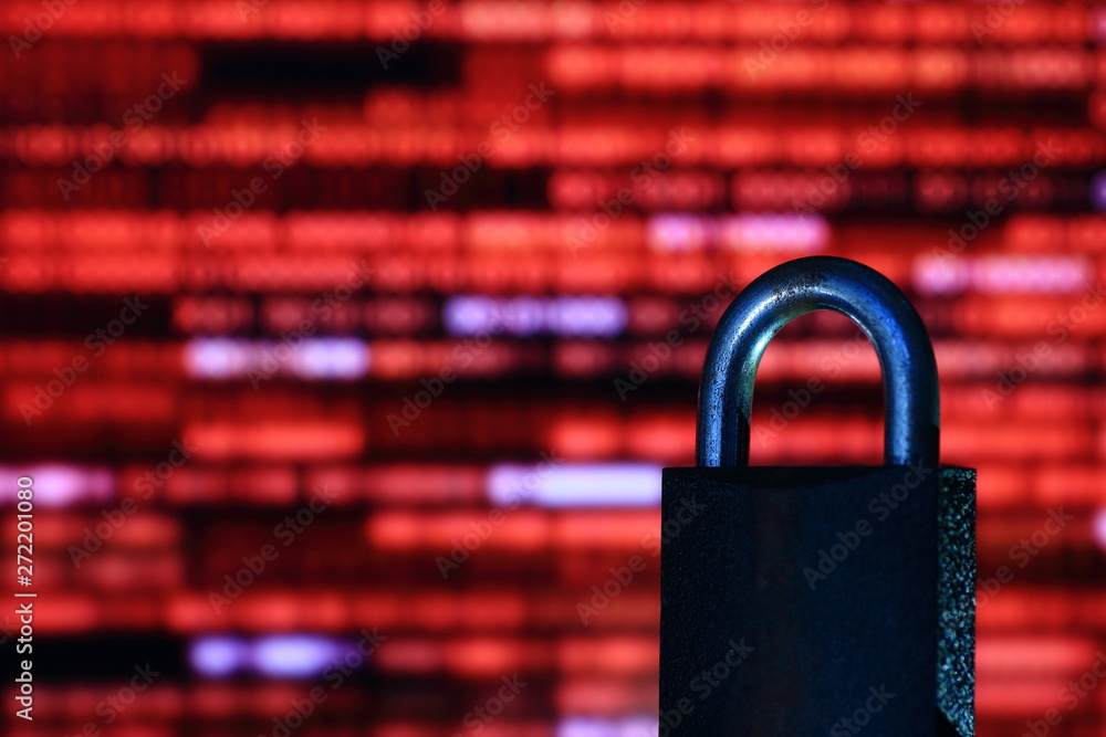 Poster binary computer language red matrix blurred be hide an iron padlock. sign of computer privacy protec