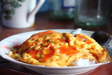 Thai style omelet on the plate